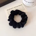 Elegante zwarte fluwelen scrunchie voor dames met zachte textuur en hoge elasticiteit - Zwart
