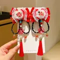 Traditional red Chinese New Year hair clips with velvet bows, silk tassels, and Fu charms - Plum Blossom Bow Short Braid