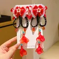 Red Chinese New Year hair clips with velvet bows, white flowers and long tassels - Peach Blossom Short Braid