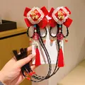 Children's New Year bow hair clips with faux braids, tassels and Chinese Fu lucky charm - Pony Pom-pom Long Braid