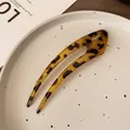Elegant U-shaped hair pin with tortoiseshell pattern and silver Ayomi logo detail - Dark Tortoiseshell U-Shaped Hair Fork