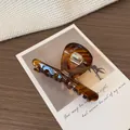 Molla per capelli minimalista in acetato tartarugato con scritta dorata fatta a mano - Molla a Croce Caffè