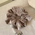 Plush coffee brown scrunchie in soft faux fur texture for autumn and winter - Light Coffee