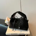 Minimalist black leopard print dumpling bag with drawstring closure and silver beads - Black With Pendant