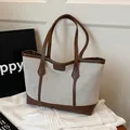 Bolso tote de gran capacidad en lona crema con elegantes asas de cuero marrón - Marrón