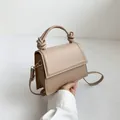 Elegante borsa beige a tracolla con manici annodati e finitura in pelle testurizzata - Kaki