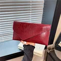 Elegant burgundy wine red envelope clutch with crocodile embossed leather texture - Red