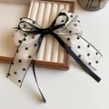 Bow hair clip with white floral organza and black ribbon detail for ponytails - Mesh Bow Flower Style