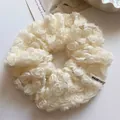 Elegant cream lace hair scrunchie with 3D floral mesh design and woven brand label - Beige Floral Scrunchie