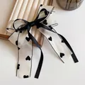 Polka dot tulle bow hair clip with black heart pattern and ribbon for girls - Mesh Bow Heart Style