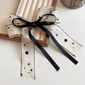 Elegant polka dot tulle bow hair clip with black satin ribbon on velvet box - Mesh Bow Polka Dot Style