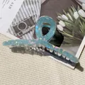 Iridescent light blue shark hair claw clip for women with pearlescent finish - Cross Twisted Large Claw / Light Blue