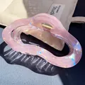 Pink French vintage shark hair claw with iridescent finish and hollow heart design - Wavy Cloud Claw / Pink
