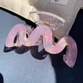 Elegant wavy acrylic hair claw in translucent holographic pink with gold spring - Wavy M-Curve Claw / Pink