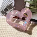 Sweet pink iridescent heart hair claw clip with gold spring for elegant styling - Hollow Heart Claw / Iridescent Purple