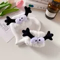 White plush monster headband with cute black horns and cartoon eyes for face washing - White (1 Pair)
