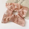Elegant champagne pink lace scrunchie with floral embroidery and brand label - Square Hair Tie Style / Dusty Pink