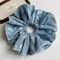 Light blue plaid scrunchie with yellow bow patterns and wavy edges for women - Denim Blue with Bow Pattern