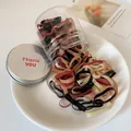 Elastic baby hair bands in assorted colors featuring a clear jar with a silver lid - Brown Coffee Thickened