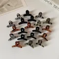 Lot de pinces à cheveux léopard et noir avec design croisé élégant en résine - Style Croisé