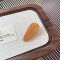 Barrette goutte en acétate ambre avec inscription dorée France Handmade - Pince Goutte d'Eau Orange