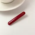 Elegante molletta in acetato bordeaux con scritta dorata Barrette La France sopra - Borgogna