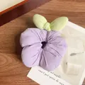 Light purple floral scrunchie with a soft green bow on a rustic wooden background - Purple Bowknot Scrunchie