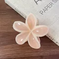 Pink and white plumeria flower hair claw clip with a glossy translucent acetate finish - Nude Pink with Beige Edge