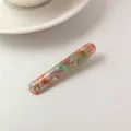Acetate hair clip with artistic floral marbling finish and gold Barrette lettering - Spring Multi-color