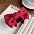Classic red satin bow hair claw clip with smooth texture for elegant hair styling - Burgundy
