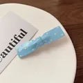 Fermaglio per capelli a fiocco azzurro a pois in resina lucida dallo stile estivo - Blu