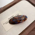 Vintage tortoiseshell acetate oval hair clip with gold France Handmade lettering - Blue Brown Oval