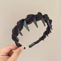 Serre-tête noir fait main avec paillettes et éléments décoratifs pointus pour femme - Serre-Tête Tressé Noir
