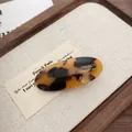 Handmade acetate hair clip with vintage tortoiseshell pattern and gold lettering - Deep Tortoiseshell Oval