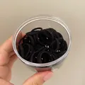 Elastic black hair ties for girls in a transparent round box for easy storage - Medium / Black