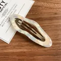 Elegant marbled blue and pink acetate teardrop hollow hair clip with gold metal frame - Pearlescent White Cloud Snap Clip