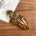 Cloud-shaped snap hair clip featuring a blue and amber tortoiseshell pattern - Blue Brown Cloud Snap Clip