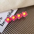 Pink acetate flower hair clip with five petals and yellow center in Korean style - Pink