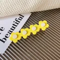 Daisy flower hair clip in bright yellow acetate finish for side hair styling - Yellow
