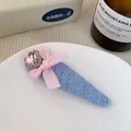 Light blue knitted hair clip with pink ribbon bow and crystal heart center detail - Bowknot Heart Necklace