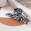 Chic black and white zebra pattern hair claw clip made of glossy acetate resin - Black and White Stripe (Large Claw)