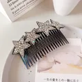Korean style black hair comb with glittering rhinestone stars on a white ceramic tray - Silver Star