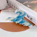 Blue and white marble acetate hair claw clip with golden brand lettering detail - Blue Stripe (Large Claw)