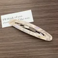 Ovaler Haarclip aus Acetat mit cremefarbener und lavendelfarbener Marmor-Textur - Cremige lila Marmorstruktur / Lila Gestreift