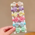 Set of 6 colorful bow elastic hair bands for girls in soft candy colors on card - Bow Style (FJ1536) / Bowtie