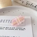 Pink translucent resin geometric hair clip with white stripes and metal grip - Hexagon