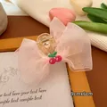 Molla per capelli a fiocco in tulle rosa con ricamo a ciliegia per bambina, 9cmx6cm - Grande Pinza per Capelli / Rosa Chiaro