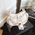 White ruched cloud handbag with pearl bead chain and bear patch detail - White