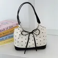 Borsa a spalla in jacquard bianco con fiocco nero e motivo floreale vintage - Nero