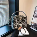 Fashionable black and white leopard print PU shoulder bag with gold V logo and top handle - Black
